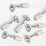 Steel nail gun nails securely fastening material to a concrete wall