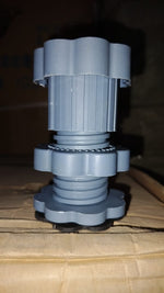 Washing machine lifted by Garth anti-skid pads, demonstrating enhanced stability and floor protection.