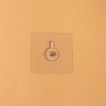 Adhesive wall hook in daily use for organization