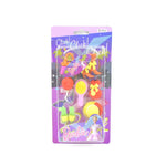 Close-up of cute erasers showing detailed designs like a cake, ice cream, and an animal.