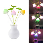 Multicolor LED mushroom night light illuminating a room with a soft glow.