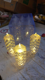 Transparent acrylic LED rose candle with a warm glow, suitable for Diwali and Christmas.