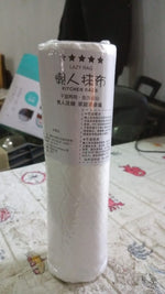 Durable kitchen tissue sheet being used to clean a car surface.