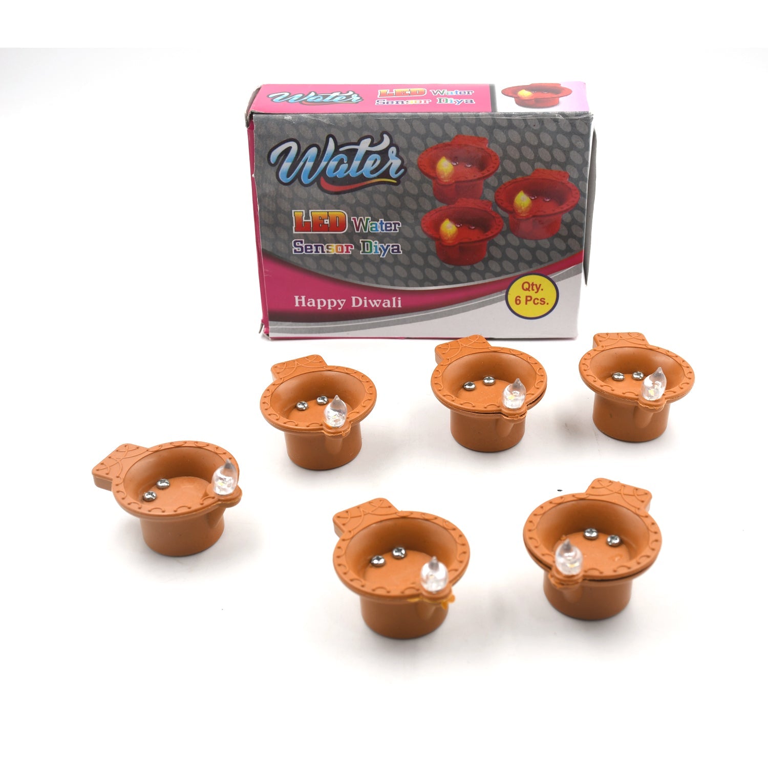 Flameless LED diyas creating a festive and safe ambiance on a decorated surface.