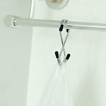 Set of 5 stainless steel S-hooks for home organization.