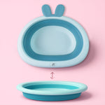 Foldable basin shown collapsed flat for easy storage in small spaces