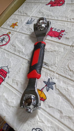Full view of the multi-function tool, emphasizing its swivel head and multiple sockets.