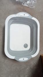 Dimensions of the foldable chopping board, illustrating its compact design.