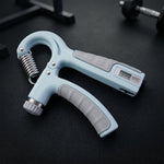 Angled view of hand gripper fitness tool