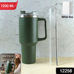 Person holding the 1200ML insulated travel mug with ergonomic handle