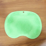 Lifestyle image using the silicone bath massage cushion in bathroom