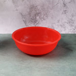Close-up of plastic red serving bowl perfect for salads and snacks