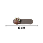 Neutral image showing size comparison of bunny face decorative hair clips