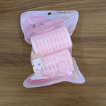 Neutral image showing hair curlers without styling context