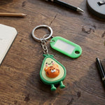 Backpack with attached cartoon character decorative keychain and ID name label