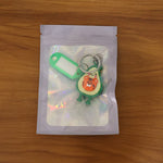 Variety of cartoon character keychains with metal rings and ID tags