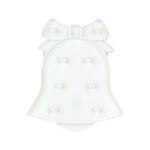 Battery operated LED Bell Shaped Night Light placed on bedside table