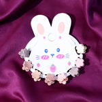 Close-up view of colorful mini hair claw clips designed for kids