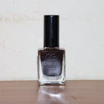 Live image showing Purple Dazzle glitter nail paint for glamorous nails