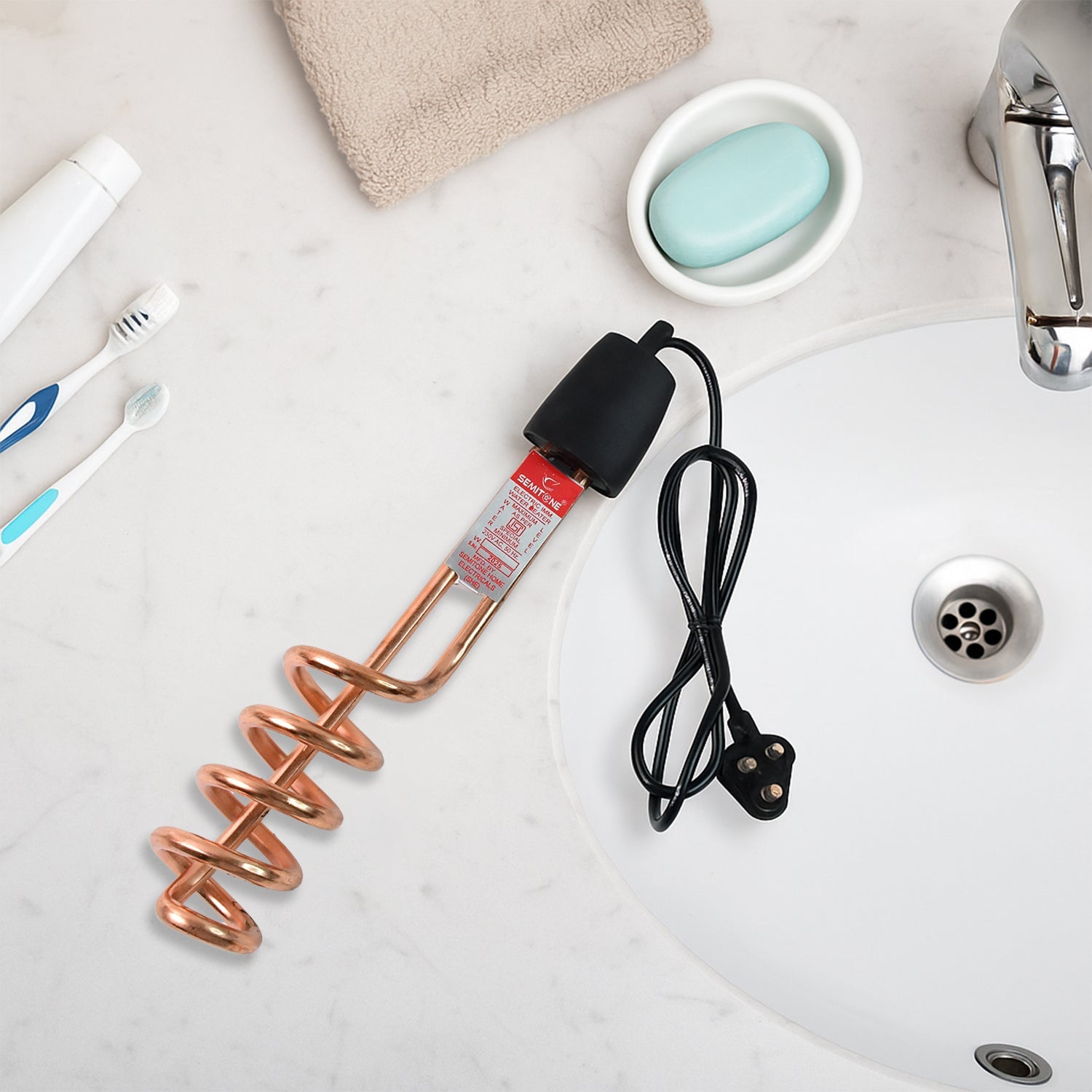 Compact immersion heater rod ideal for home and travel use