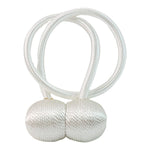 Two magnetic curtain tiebacks displayed, highlighting their flexible rope design.