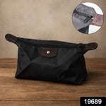 Waterproof multipurpose travel organizer pouch in black with brown detailing