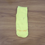 Lifestyle image of yellow casual crew socks in use