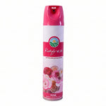 Rose fragrance air freshener spray in hands