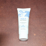 Lifestyle image featuring usage of Aqua Face Wash for fresh skin