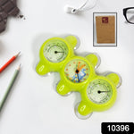 Sleek plastic desktop clock with clear digital display on an office desk setting.