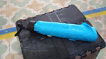 A hand holding the DrizzlePro 3-fold umbrella, illustrating its ergonomic design and convenient size.