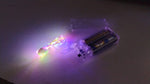 Battery powered waterproof copper wire string fairy lights illuminating outdoor space.