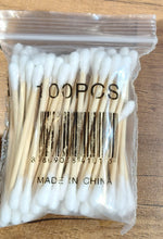 Eco-friendly cotton swabs packaging highlighting biodegradable wooden stems
