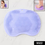 Purple silicone bath mat with exfoliating bristles and anti-slip suction cups on floor