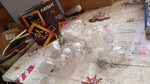 Wish Ball LED string lights glowing in the dark, perfect for festival lighting.