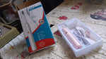 Detailed view of the Electric Toothbrush head, showing bristles and tongue cleaner.