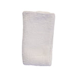 Cleaning cloth wiping fog-free bathroom mirror