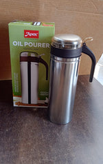 Full height view of stainless steel oil pourer showcasing sleek design