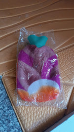 Hot water bottle bag showing durable rubber and protective soft cover