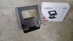 Compact size of the rotating laptop stand when folded, ideal for travel.