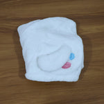 Microfiber hair drying towel wrap displayed for hair care routine