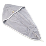Folded quick-dry hair towel in a vibrant pink color.