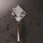 Sticky transparent wall hook showing strong self-adhesive backing