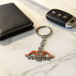 Close-up of one Krishna keychain showcasing metal quality and spiritual design.