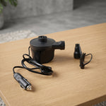 Close-up of electric air pump used for inflating car mattress