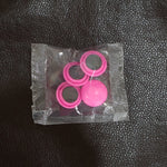 A collection of Round Fridge Magnets in multiple hues, perfect for home and office use.